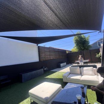 Kavat Coffee - Back patio with couches and tables and a ping pong table - Coffee & Tea Near Me - Los Angeles, California
