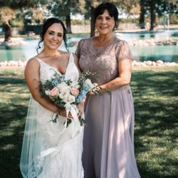 Bianca's Bridal Couture - Wedding dress and mother of the bride dress. Both dresses were purchased and altered at Bianca's.