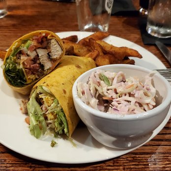 Mad Boar Restaurant & Pub - Grilled chicken bacon wrap, potato wedges, slaw. - American Near Me - Wallace, North Carolina Mad Boar Restaurant & Pub - Grilled chicken bacon wrap, potato wedges, slaw. - American Near Me - Wallace, North Carolina