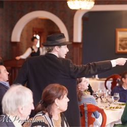 Dial M Murder Mysteries - Detective Riley points out a suspect in A Dial M Murder Mystery