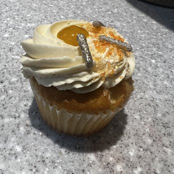 Frost Artisan Bakery - a cupcake with icing - Bakeries Near Me - Buffalo, New York