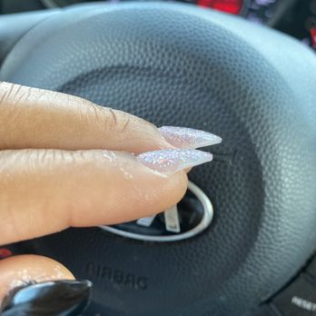 Paradise Nail Spa - Both nails on side missing cover coverage - Nail Salons Near Me - Mansfield, Texas