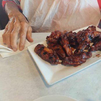 Blue Dog Bar & Grill - BBQ Wings - Bars Near Me - Matlacha, Florida