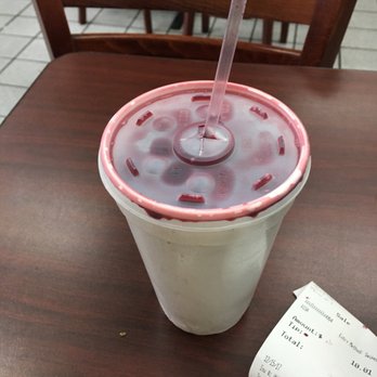 Super Chicken - a drink in a plastic cup with a straw - Chicken Wings Near Me - Manassas, Virginia Super Chicken - a drink in a plastic cup with a straw - Chicken Wings Near Me - Manassas, Virginia
