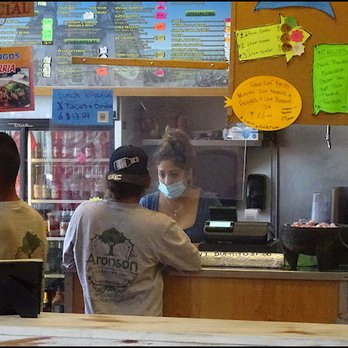 Taqueria Guadalajara - I peek over the partition and watch busy Stephanie taking orders from customers. This lady wore "many hats" today and did an amazing job! - Mexican Near Me - Antelope, California Taqueria Guadalajara - I peek over the partition and watch busy Stephanie taking orders from customers. This lady wore "many hats" today and did an amazing job! - Mexican Near Me - Antelope, California
