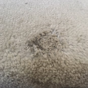 Maids2Rescue - Hole burned in carpet - Home Cleaning Near Me