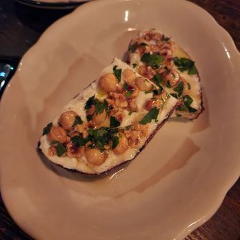 Sotto - goat cheese, hazelnut honey, grilled bread. - Italian Near Me - Cincinnati, Ohio Sotto - goat cheese, hazelnut honey, grilled bread. - Italian Near Me - Cincinnati, Ohio