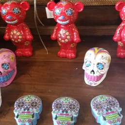 Dia de Los muertos candy skulls. Lots of eclectic decor and jewelry here.