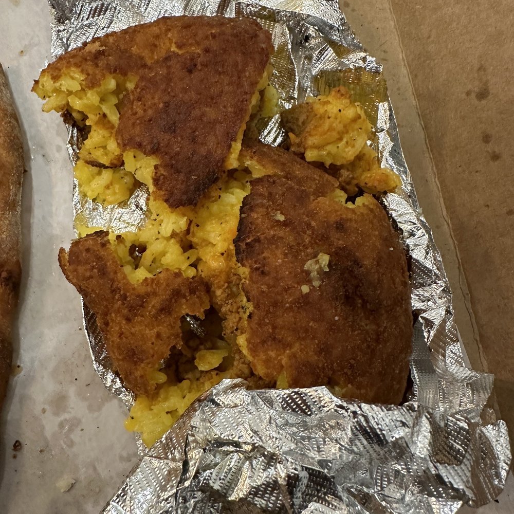 Fazio's - a half eaten pizza and a half eaten pizza - Pizza Near Me - Brooklyn, New York