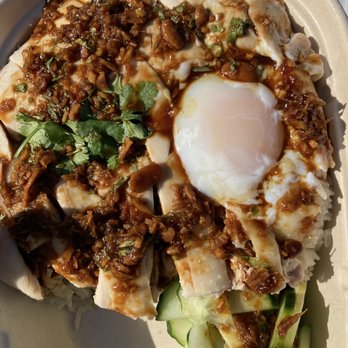 Rooster & Rice - The Original with soft cooked Egg, covered in their sauce. - Chicken Shop Near Me - Pleasanton, California Rooster & Rice - The Original with soft cooked Egg, covered in their sauce. - Chicken Shop Near Me - Pleasanton, California