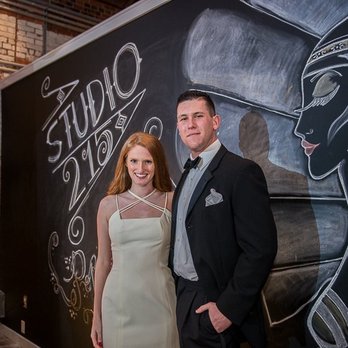 Studio 215 - Couple posing in front of our chalkboard wall - Venues & Event Spaces Near Me - Fayetteville, North Carolina Studio 215 - Couple posing in front of our chalkboard wall - Venues & Event Spaces Near Me - Fayetteville, North Carolina