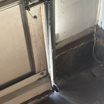 Around The Clock Garage Doors - Before the repair, wheels off the track. - Garage Door Services Near Me - San Jose, California