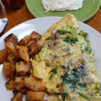 Sunrise Breakfast - Vegetables omelette with homemade fries, one the side one over easy egg. - Breakfast & Brunch Near Me - Norwood, Massachusetts Sunrise Breakfast - Vegetables omelette with homemade fries, one the side one over easy egg. - Breakfast & Brunch Near Me - Norwood, Massachusetts