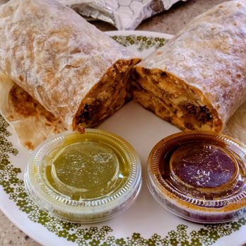 LaCarcacha - chorizo burrito. The dark spot on each half was the only chorizo part of the burrito. - Mexican Near Me - Lake Havasu City, Arizona LaCarcacha - chorizo burrito. The dark spot on each half was the only chorizo part of the burrito. - Mexican Near Me - Lake Havasu City, Arizona