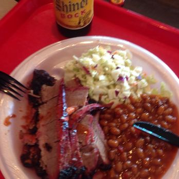 Donn's BBQ & Catering - Two meat plate (brisket and pork ribs underneath) with beans and coleslaw. - Barbeque Near Me - Austin, Texas Donn's BBQ & Catering - Two meat plate (brisket and pork ribs underneath) with beans and coleslaw. - Barbeque Near Me - Austin, Texas