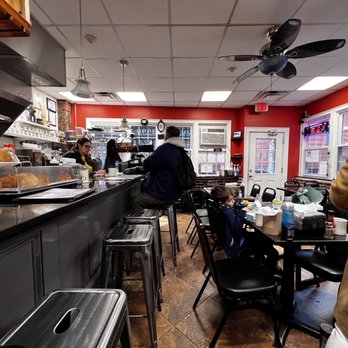 Theo's Cozy Corner - people sitting at tables in a restaurant - Breakfast & Brunch Near Me - Boston, Massachusetts