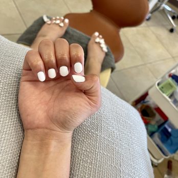 Lush Nails & Spa - Regular white nail polish on my natural short and rounded nails - Nail Salons Near Me - Oxnard, California