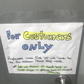 Shell - a sign posted on the door of a bathroom stall - Gas Stations Near Me - McCleary, Washington