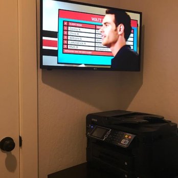 Bay Area Wall Mounts - 28" TV wall mounted with cords behind the wall. - Home Theatre Installation Near Me
