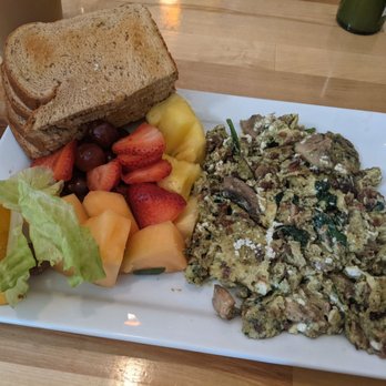 Pete's Egg Nest - Pesto Florentine scramble w fruit (Sept 2021) - Breakfast & Brunch Near Me - Seattle, Washington Pete's Egg Nest - Pesto Florentine scramble w fruit (Sept 2021) - Breakfast & Brunch Near Me - Seattle, Washington