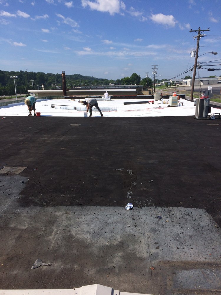 Slide of Advanced Roofing & Paving