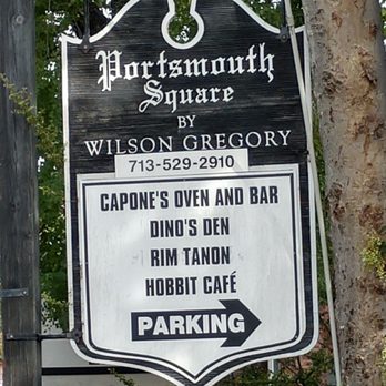 Hobbit Cafe - Sign of what places are immediately near (same parking lot). - Burgers Near Me - Houston, Texas Hobbit Cafe - Sign of what places are immediately near (same parking lot). - Burgers Near Me - Houston, Texas