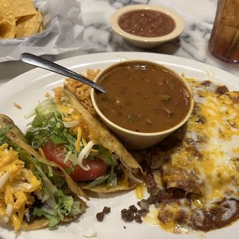 Jorge's Cafe - Two enchilada and two crunchy tacos combo plate with charro beans and rice - Mexican Near Me - Odessa, Texas