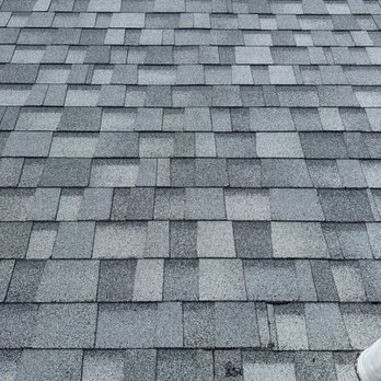 GS Interiors - the roof of a house with a shingled roof - General Contractors Near Me GS Interiors - the roof of a house with a shingled roof - General Contractors Near Me