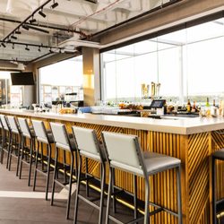 Sky Blu Rooftop - Bar seating with a great view of the Dallas skyline.