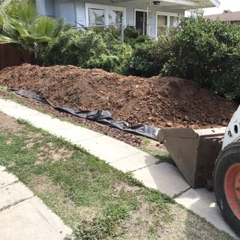 M & M Hauling and Bobcat - Mike was just getting started with the Bobcat. - Dumpster Rental Near Me - Lakeside, California