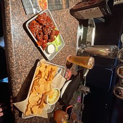 BJ's Restaurant & Brewhouse - Boneless wings. Artichoke dip. Brewhouse blonde. Skinny margarita with muddled strawberries.