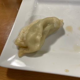 a dumpling on a plate
