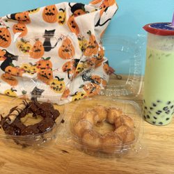 Seagulls Ice Cream & Soda Fountain - honeydew melon milk tea, cinnamon mochinut, chocolate mochinut