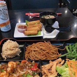 Miso soup, veggie rolls, bento box Miso soup, veggie rolls, bento box