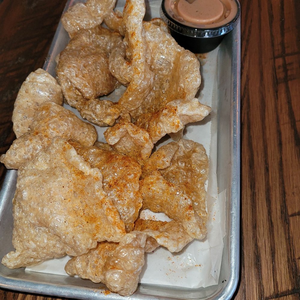 Squid Ink Eclectic Eats & Drinks - Fried pork skins - Gastropubs Near Me - Mobile, Alabama Squid Ink Eclectic Eats & Drinks - Fried pork skins - Gastropubs Near Me - Mobile, Alabama