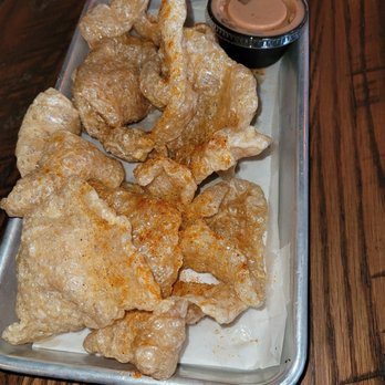 Squid Ink Eclectic Eats & Drinks - Fried pork skins - Gastropubs Near Me - Mobile, Alabama Squid Ink Eclectic Eats & Drinks - Fried pork skins - Gastropubs Near Me - Mobile, Alabama