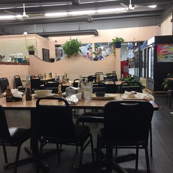Las Fuentes - a dining area with tables and chairs - Mexican Near Me - Knoxville, Tennessee Las Fuentes - a dining area with tables and chairs - Mexican Near Me - Knoxville, Tennessee