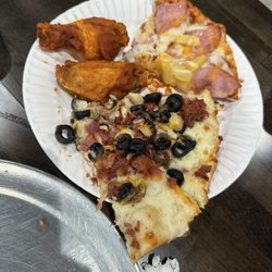 Straw Hat Pizza - White sauce chicken pizza, Canadian bacon and pineapple pizza, and wings.