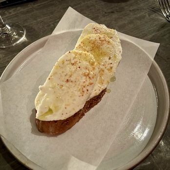 Lilia - Housemade mozzarella, toasted garlic bread, lemon, bottarga. - Italian Near Me - Brooklyn, New York Lilia - Housemade mozzarella, toasted garlic bread, lemon, bottarga. - Italian Near Me - Brooklyn, New York