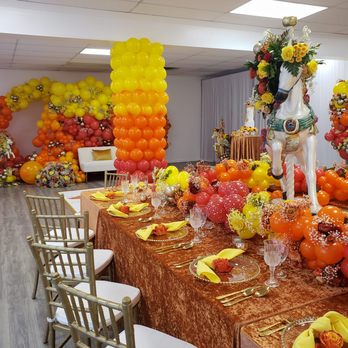 The Balloon Boutique - Carnival-themed baby shower with vibrant balloon decor, carousel horse centerpiece & luxe table design. A whimsical, over-the-top setup! - Party & Event Planning Near Me