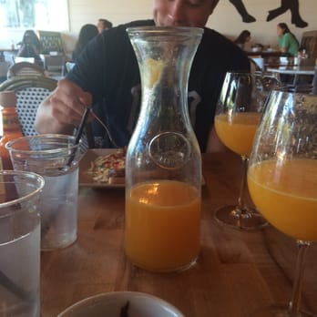 Adair Kitchen - Huge carafe of mimosas with freshly squeezed OJ - New American Near Me - Houston, Texas Adair Kitchen - Huge carafe of mimosas with freshly squeezed OJ - New American Near Me - Houston, Texas