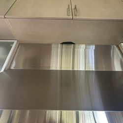 Hole in upper cabinet
