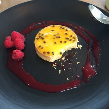 Swan - Sorry I already took a bite... Passion fruit tart with raspberry compote - British Near Me - Bankside, XGL