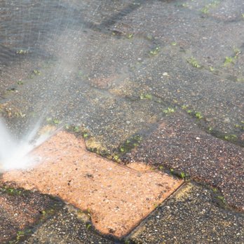 AFG General Contractors - a pressurer on a brick sidewalk - General Contractors Near Me - Vancouver, British Columbia