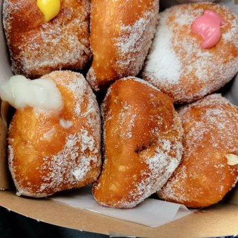 Leonard's Bakery - 6 of the puffs. Look at all that filling!! - Bakeries Near Me - Honolulu, Hawaii Leonard's Bakery - 6 of the puffs. Look at all that filling!! - Bakeries Near Me - Honolulu, Hawaii