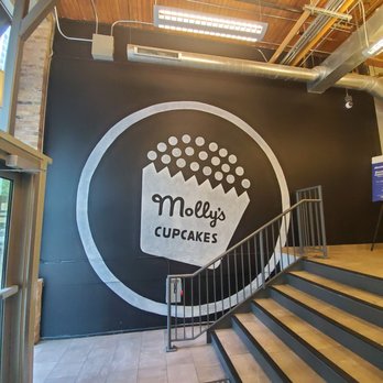 Molly's Cupcakes - Molly's cupcakes indoor logo - Cupcakes Near Me - Chicago, Illinois Molly's Cupcakes - Molly's cupcakes indoor logo - Cupcakes Near Me - Chicago, Illinois