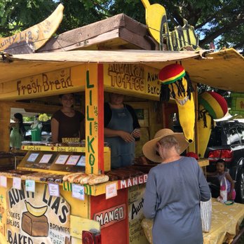 Aunty Lia's Baked Goods - a woman standing in front of a food cart - Desserts Near Me Aunty Lia's Baked Goods - a woman standing in front of a food cart - Desserts Near Me