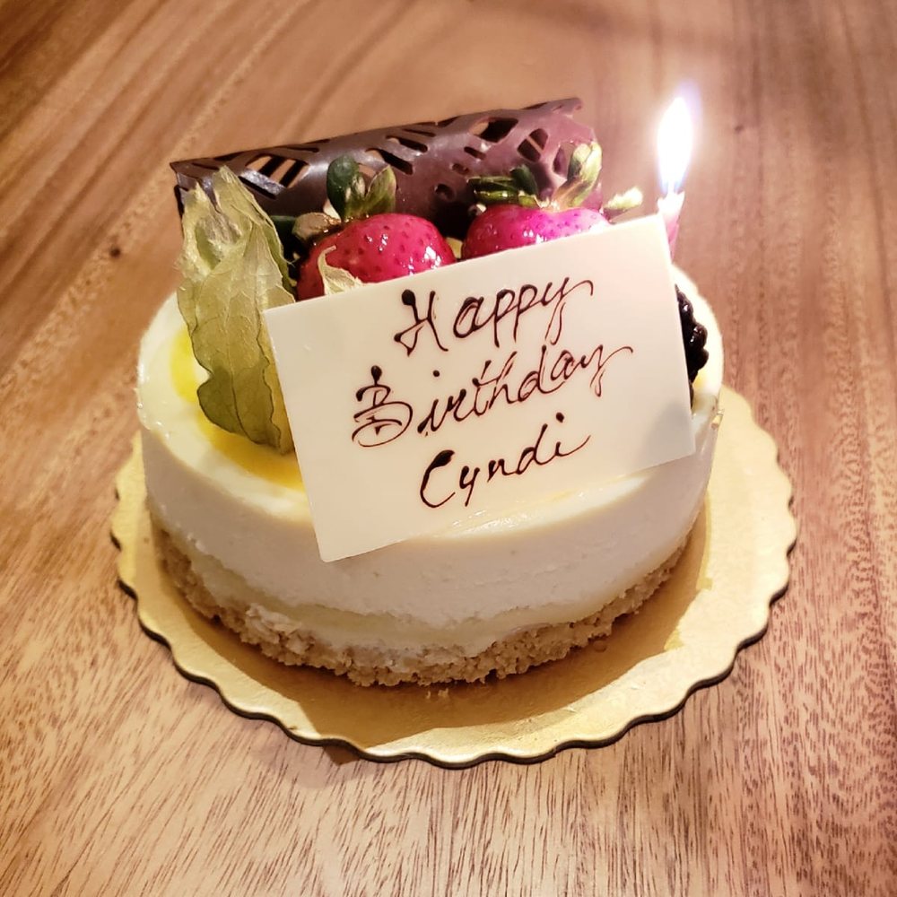 Passionfruit cheesecake. They threw in a candle too! Passionfruit cheesecake. They threw in a candle too!