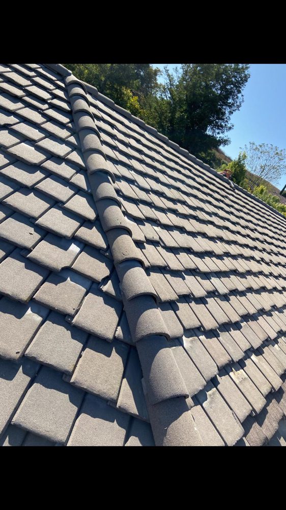 Slide of AAA Roofing Services