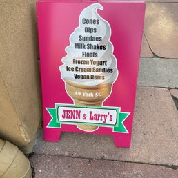 a sign for the ice cream parlor a sign for the ice cream parlor